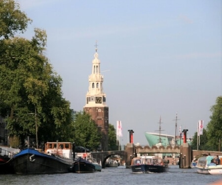 Amsterdamse gracht met boten — vaarroutes en tips